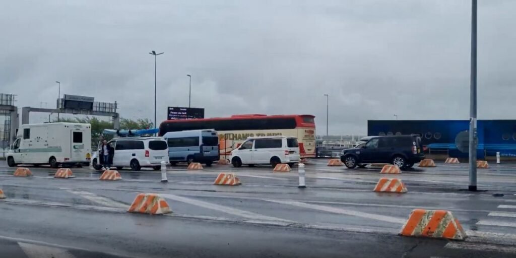 Coaches, buses, minibuses and campers waiting in line at the Channel Tunnel check-in