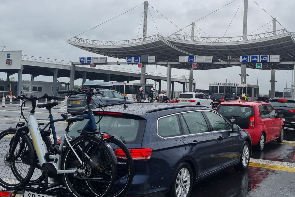 Car with bicycles on a rack at the Eurotunnel LeShuttle terminal
