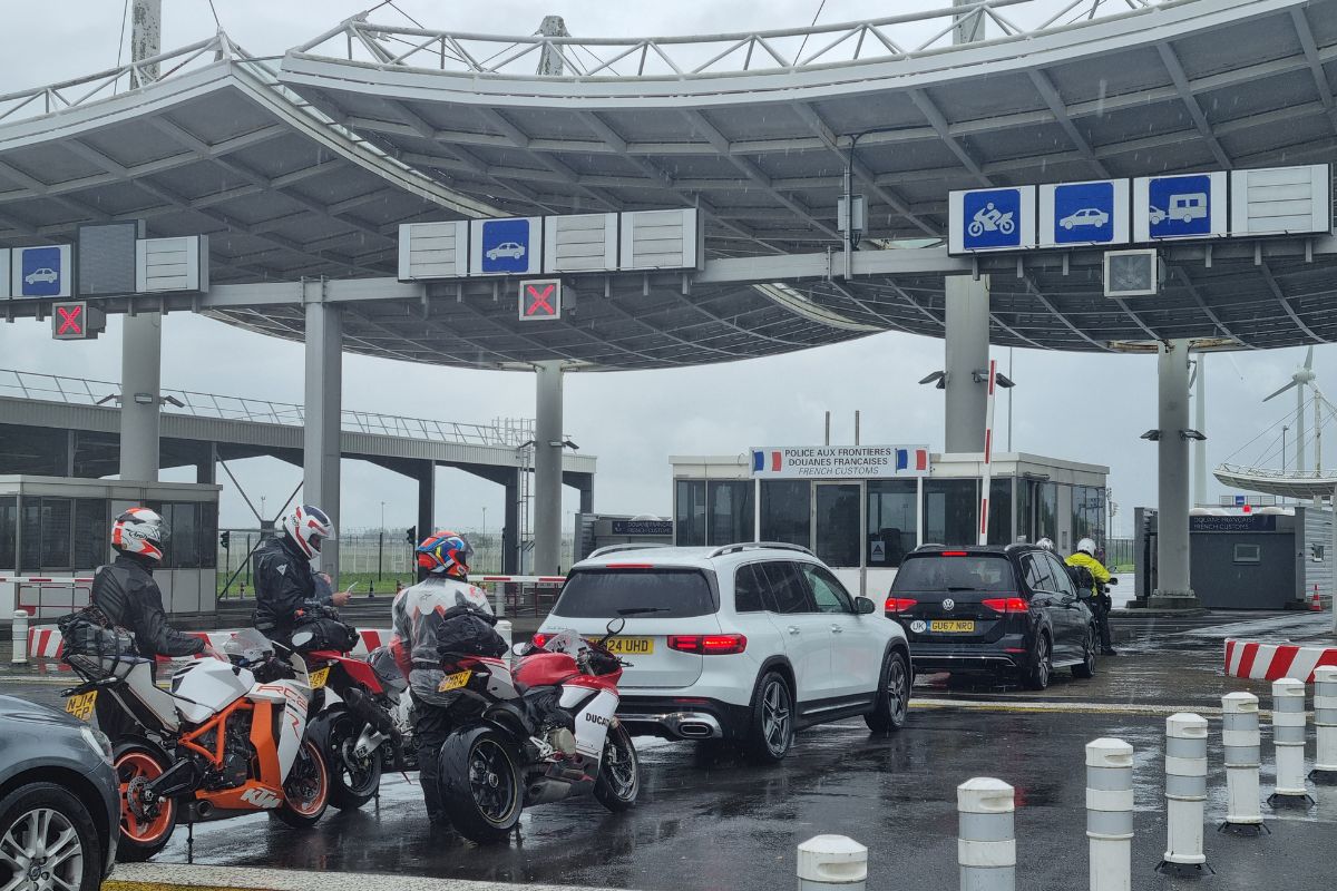Border control at the LeShuttle Channel Tunnel terminal, showing passport and customs checks