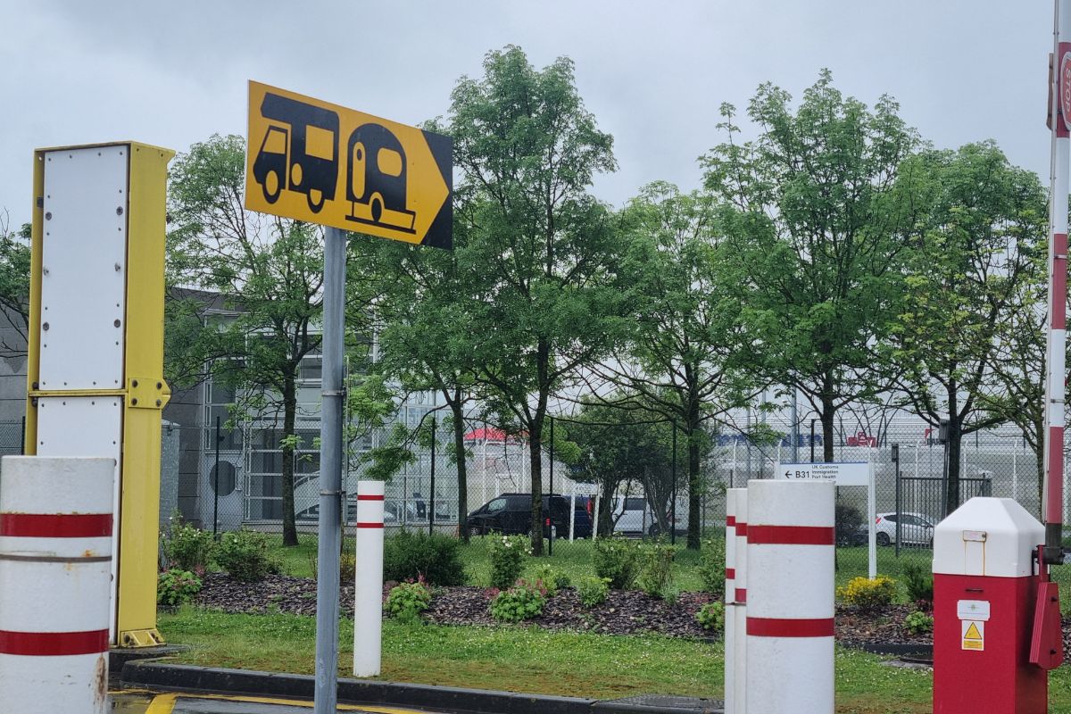 Signage directing caravans to the correct lane at the Eurotunnel terminal