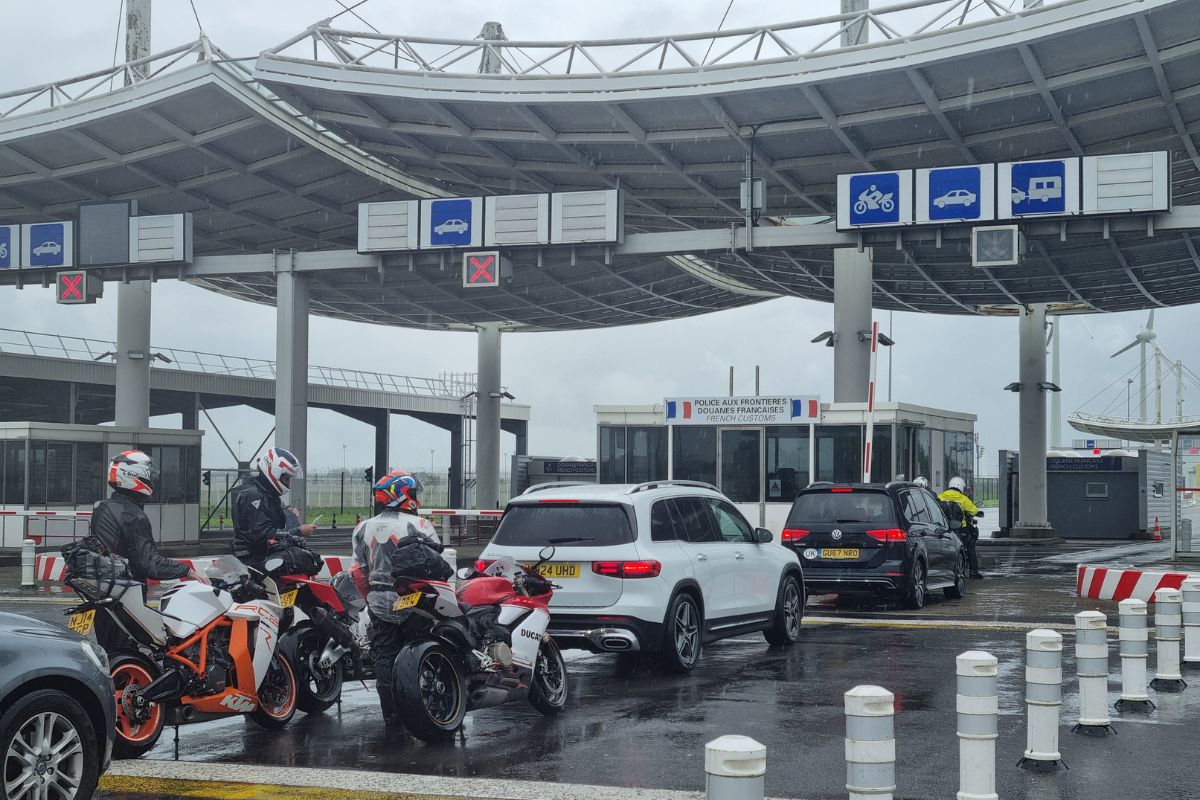 A motorcyclist at Eurotunnel border control at the Folkestone terminal before riding onto the Channel Tunnel LeShuttle train