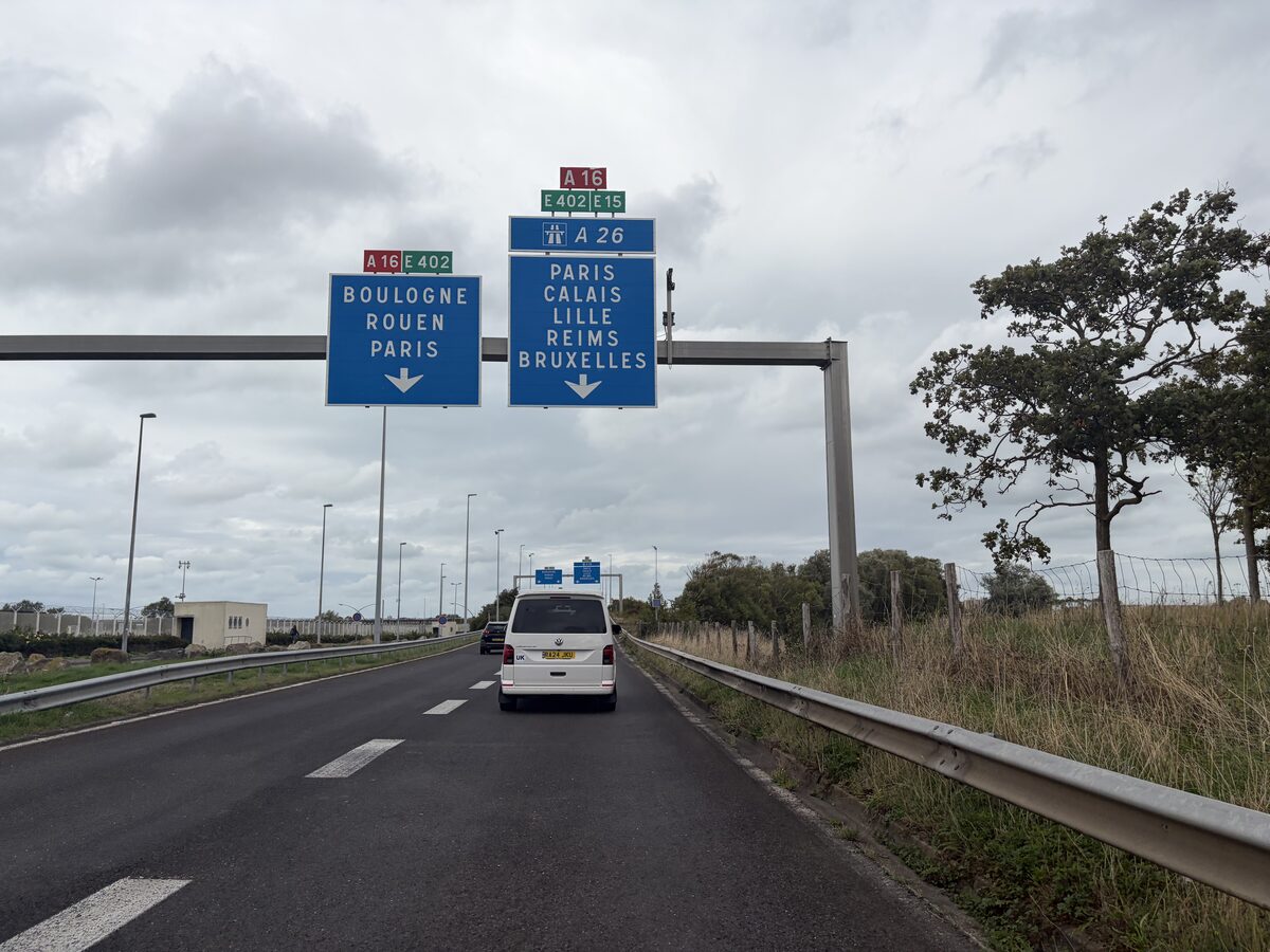 A16 motorway signs for Boulogne Paris and A26 Lille Bruxelles after leaving the Calais terminal