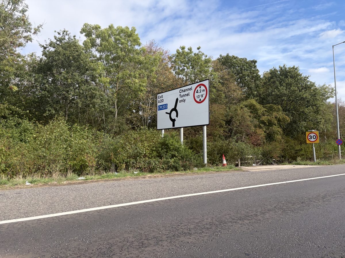 Roundabout sign at junction 11A marked Channel Tunnel only with a 4.2 m height limit