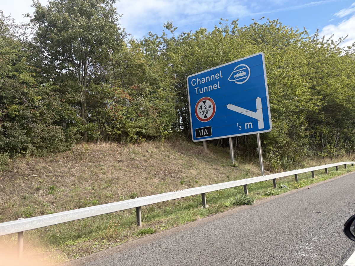 M20 sign for junction 11A Channel Tunnel half a mile ahead with 4.2 m height limit