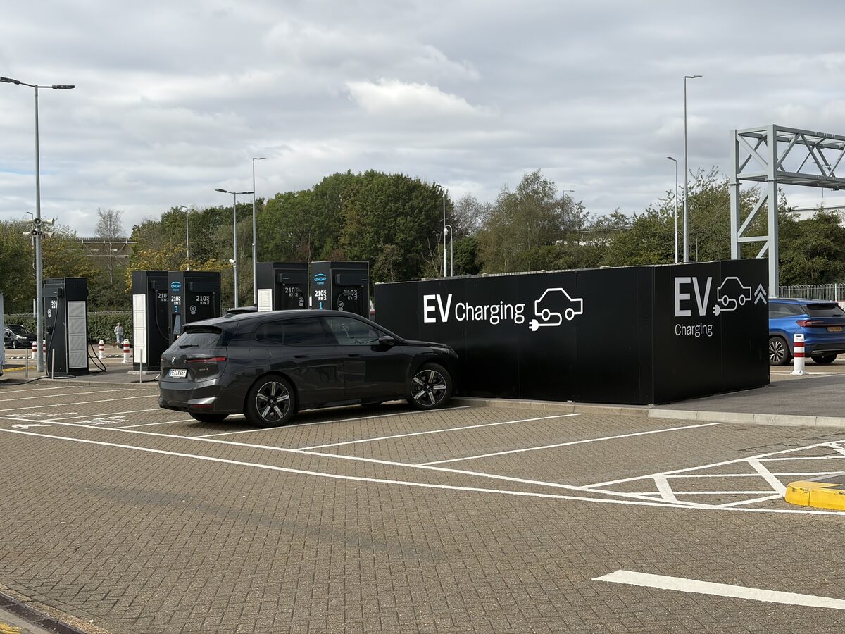EV Charging area with charging points and cars at the Folkestone terminal
