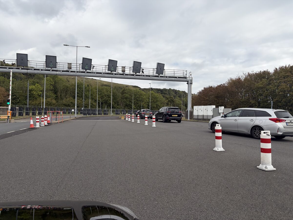 Boarding lanes with cones and overhead gantry at the LeShuttle Folkestone terminal