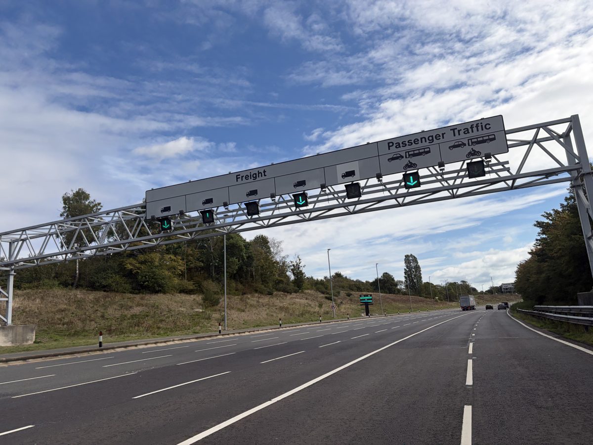Approach road at Folkestone with overhead gantry separating freight and passenger traffic