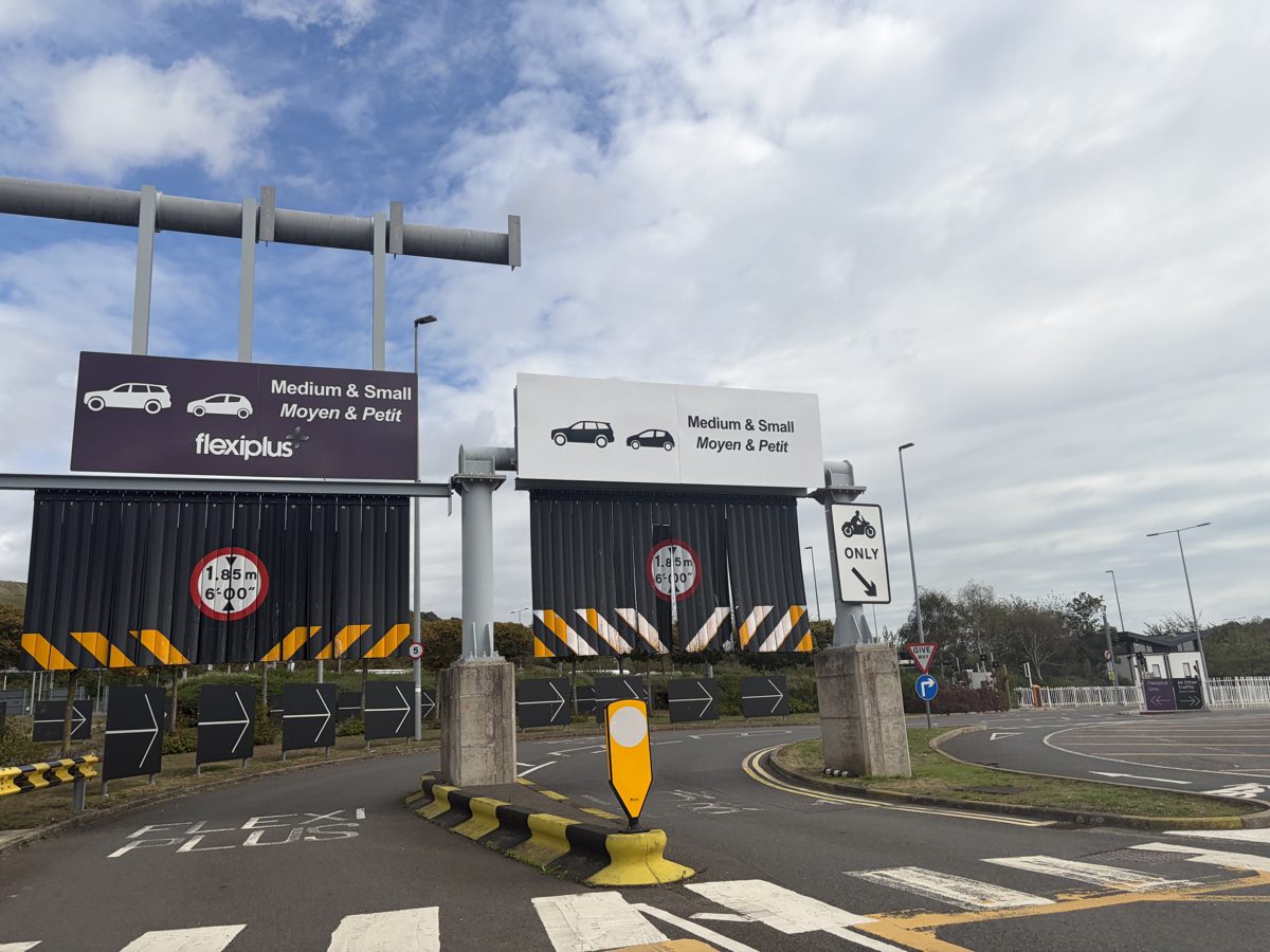 Lane allocation gantry with Medium and Small and Flexiplus signs at the Folkestone terminal