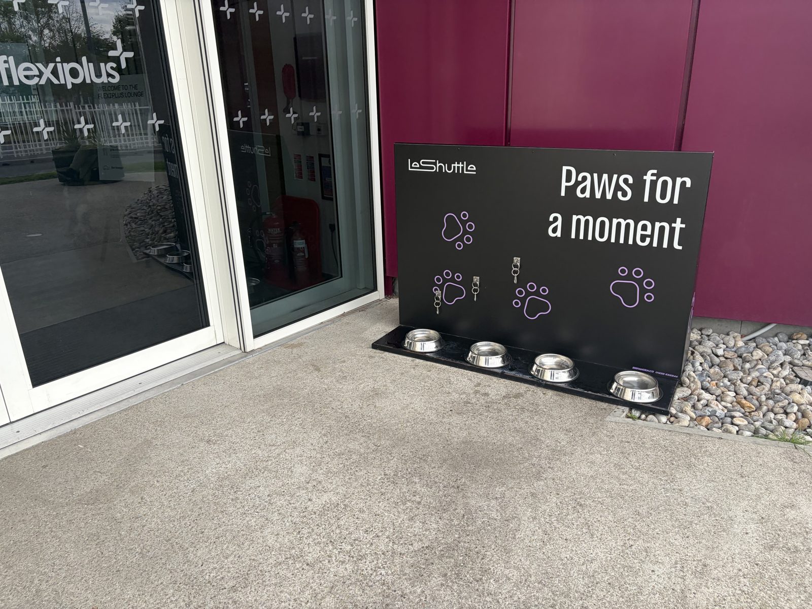 Entrance to the Flexiplus lounge at Folkestone with a LeShuttle dog water station