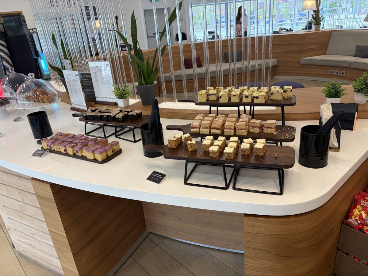 Complimentary food counter with cakes inside the Flexiplus lounge at Folkestone