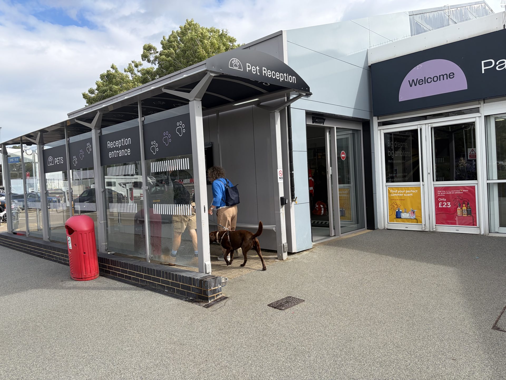 Travellers with a dog entering the Pet Reception at the Folkestone terminal