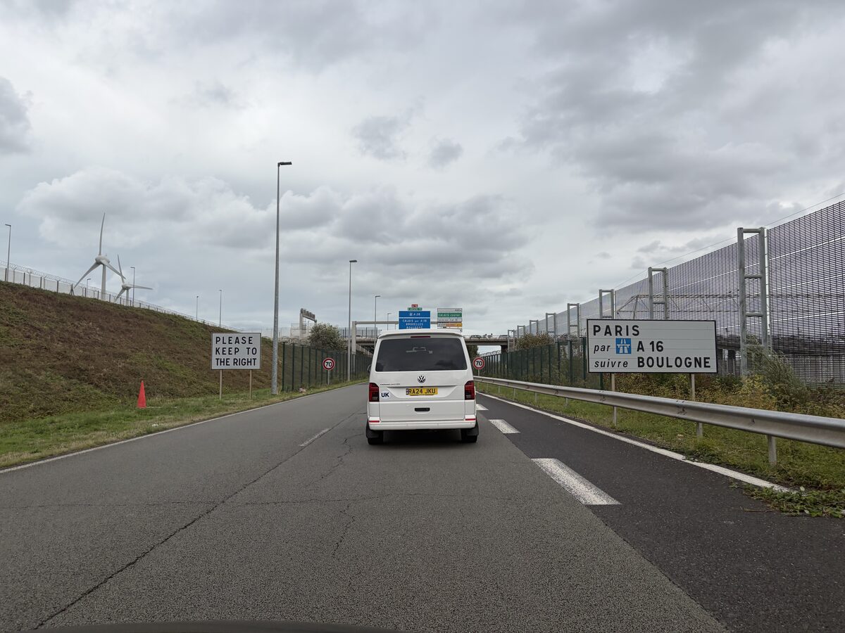 Please Keep To The Right and Paris via A16 signs on the exit road at Calais